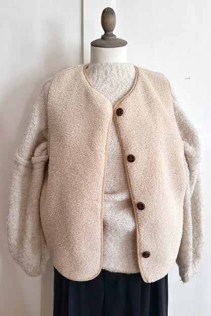 Kuschelweste mit Knöpfen